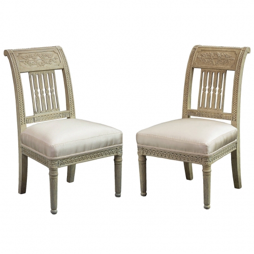 A Pair of Directoire Cream-Painted Slipper Chairs
